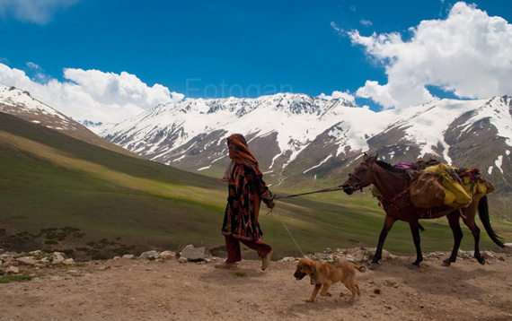 women with horse in hills
